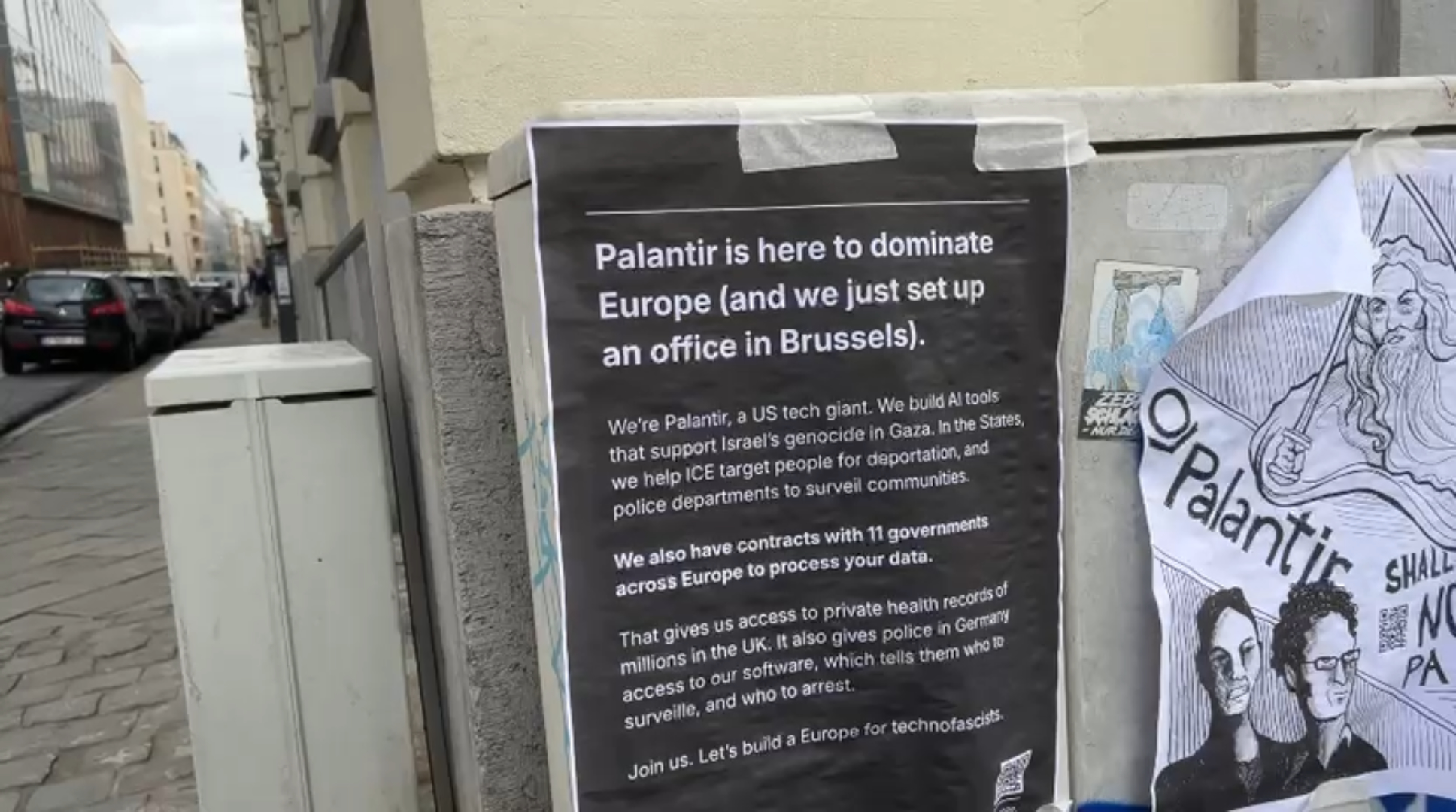 Wereldwijd verzet tegen data-gigant Palantir zwelt aan: posters duiken op in het straatbeeld